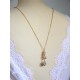 Collier mariage de dos doré et pendentifs zirconium