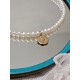 Collier tour de cou perles de culture d'eau douce et pendentif médaille étoile
