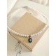Collier tour de cou perles de culture d'eau douce et pendentif marcassites