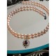 Collier perles de culture grains de riz rose saumon et grenat