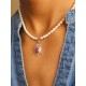 Collier perles de culture grains de riz et amulette rubis Saïra