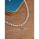 Collier perles de culture et amulette citrine Isaraa