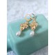 Boucles d'oreilles mariage cascade fleurs pensées ciselées - Prêt à porter mariage